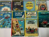 a lot of children ' s books on display on a table