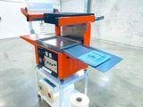 an image of a machine that is in a warehouse