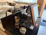 an image of a kitchen with a counter and a monitor