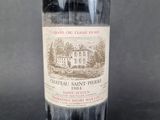 a bottle of wine that is sitting on a table