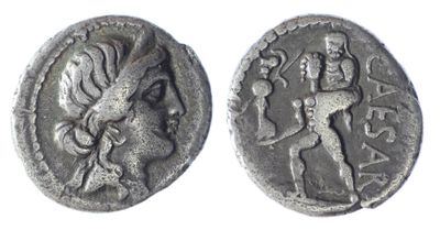 a silver coin with an image of a man and a woman on it