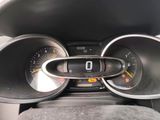 a close up of a car dashboard with a speedometer and gauges