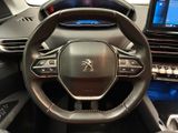 the interior of a car with a steering wheel and dashboard controls