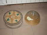 two plates on the floor next to each other on the floor