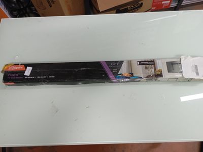 a box with a remote on it sitting on a table