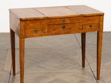 an image of a wooden desk with drawers on it