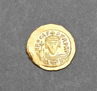 an image of a gold coin with an image of a man on it