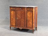 a cabinet with a marble top on a gray background