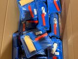 a cardboard box filled with assorted cleaning supplies