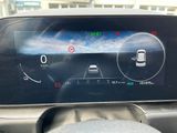 a picture of a car dashboard with a digital display