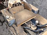 an image of a car being worked on in a garage