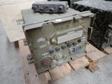 a radio sitting on top of a pallet on a pallet