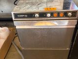 an image of a dishwasher with a box of eggs in the background
