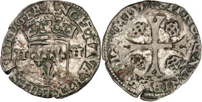 une pièce d'argent avec une croix au recto et une croix au verso