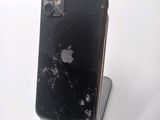 a broken iphone sitting on top of a stand