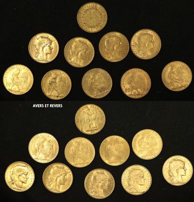 a close up of a bunch of gold coins on a black surface