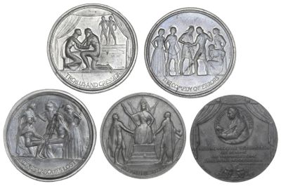 four different types of silver coins are shown on a white background