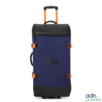 a blue suitcase with orange handles and a logo on it