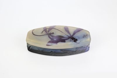a white and purple soap dish with a dragonfly on it
