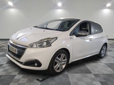 a picture of a white car parked in a showroom