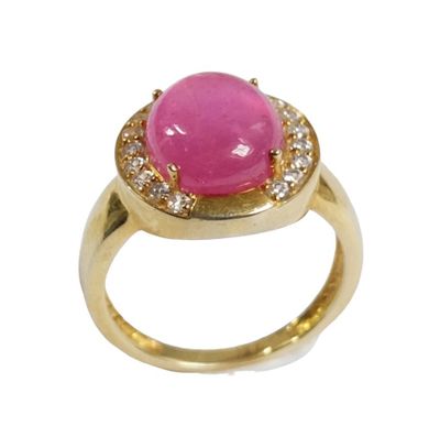BAGUE en argent doré 925/1000 sertie d'un rubis en cabochon …