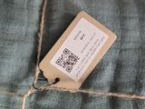 an image of a piece of fabric with a tag on it