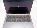 an apple macbook pro laptop computer sitting on top of a white table