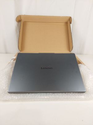 lenovos laptop in a box on a white surface