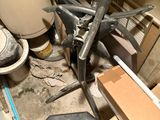 an image of a messy room with a bike and tools