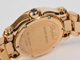 a close up of a gold watch with a blue face