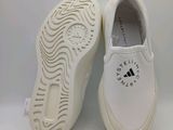 adidas superstar slip on shoes in white with black logo