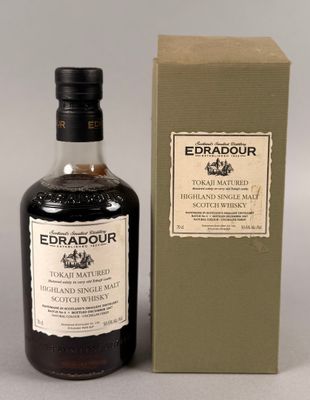 une photo d'une bouteille de whisky Erradour à côté d'un carton