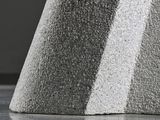 a close up view of a piece of concrete on the floor