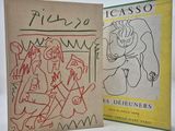 deux livres illustrés posés l'un à côté de l'autre