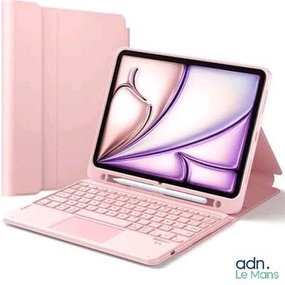 une image représentant un ordinateur portable rose sur lequel est posé un clavier