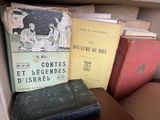 many books that are sitting in a box together