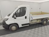 a white truck that is parked in a room