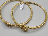 a pair of gold plated hoop earrings