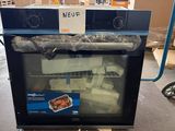 an image of a microwave that is sitting on a pallet