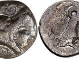 a close up of a coin with an image of a man on it