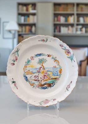 a plate that has a picture of a woman on it