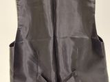 an image of a black vest on a hanger