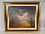 une peinture à l'huile représentant un paysage avec des nuages et des arbres, dans un cadre doré