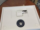 a white tray with a blue ring on top of it