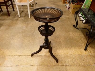 a table with a basket on top of it in a room