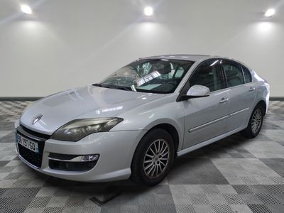 a picture of a silver car parked in a garage