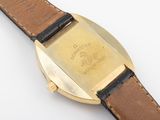an image of a close up of a watch on a white surface