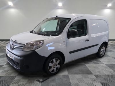 a picture of a white van on a checkered floor