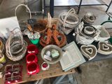 a table with many baskets and other items on it