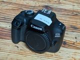 a camera that is sitting on a wooden table
